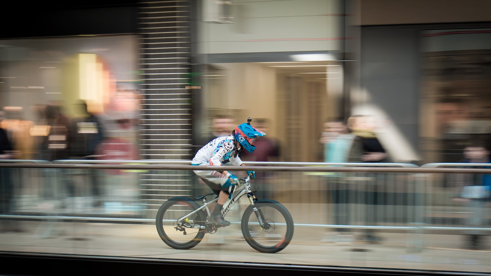 Time lapse photography of man riding bicycle